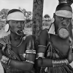 Женщины Мурси и Сурма единственные в мире носят губные тарелки. Национальный парк Маго, регион Джинка. Эфиопия. 2007
(c) Себастио Сальгадо / Amazonas images